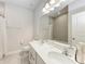 Elegant bathroom with double sink vanity, large mirror and a shower and tub combo at 1766 Sunset Preserve Way, Port Charlotte, FL 33953