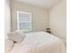 Bright bedroom featuring a comfortable bed and lots of natural light at 1766 Sunset Preserve Way, Port Charlotte, FL 33953