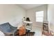 Modern home office with comfortable furnishings and natural light at 1766 Sunset Preserve Way, Port Charlotte, FL 33953