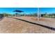 Community playground featuring slides, swings, and shaded play areas for children to enjoy in a safe environment at 1766 Sunset Preserve Way, Port Charlotte, FL 33953