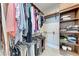 Spacious walk-in closet features custom shelving and ample storage for organization at 1766 Sunset Preserve Way, Port Charlotte, FL 33953