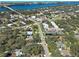 Areal view of the property within a residential neighborhood near the water at 1769 Manasota Beach Rd, Englewood, FL 34223