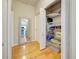 Well-organized closet with wire shelving, providing ample storage space for linens, clothing, and other items at 1769 Manasota Beach Rd, Englewood, FL 34223