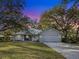 Charming single Gathering home with a well-manicured lawn and a metal roof at 1769 Manasota Beach Rd, Englewood, FL 34223