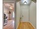 Bright foyer with wood flooring and an arched entryway at 1769 Manasota Beach Rd, Englewood, FL 34223