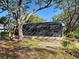 Exterior shot of the screened-in lanai at 1769 Manasota Beach Rd, Englewood, FL 34223