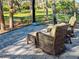 Comfortable outdoor seating on the screened-in patio, perfect for relaxing and enjoying the backyard view at 1769 Manasota Beach Rd, Englewood, FL 34223