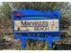 Blue Manasota Beach community sign at 1769 Manasota Beach Rd, Englewood, FL 34223