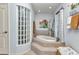 Relaxing bathroom features a soaking tub, glass block window, and tile surround at 18382 Arapahoe Cir, Port Charlotte, FL 33948