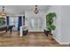Elegant foyer with beautiful wood-look tile flooring, stylish lighting, and a charming entryway at 18382 Arapahoe Cir, Port Charlotte, FL 33948