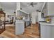 Modern kitchen with stainless steel appliances, white countertops, and light gray cabinetry at 18382 Arapahoe Cir, Port Charlotte, FL 33948