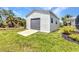 A large shed in the back yard provides plenty of storage for any toys and tools you may want at 18382 Arapahoe Cir, Port Charlotte, FL 33948