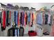 Spacious walk-in closet with ample storage space for clothing and luggage at 19800 Montenero Way, Venice, FL 34293