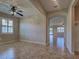 Bright living room with tile flooring, and neutral paint at 19911 Quisto St, Venice, FL 34293