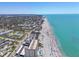 Breathtaking aerial view showcasing coastal living with beach access and nearby amenities at 200 The Esplanade N # B3, Venice, FL 34285