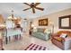 Bright living room with a sofa, chair, tile floor and seamless flow into dining area and kitchen at 200 The Esplanade N # B3, Venice, FL 34285