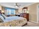 Main bedroom with a comfortable bed, lamps, bureau, and plenty of space at 200 The Esplanade N # B3, Venice, FL 34285