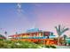 Beachfront restaurant boasting an ocean view, outdoor seating, and tropical setting at 200 The Esplanade N # B3, Venice, FL 34285