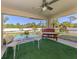 Outdoor screened patio featuring seating area with table and chairs and peaceful outdoor space at 2098 Zellwood Ter, North Port, FL 34286