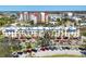 Beautiful aerial view of downtown streetscape with buildings, trees, and parked cars at 238 Tampa W Ave # 217, Venice, FL 34285