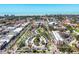 Expansive aerial shot of the city showing the well manicured landscaping and dense tree canopy at 238 Tampa W Ave # 217, Venice, FL 34285