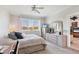 Serene bedroom with a large window and neutral tones for a relaxing atmosphere at 238 Tampa W Ave # 217, Venice, FL 34285