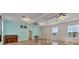 Large multi-purpose room with hardwood floors, neutral walls, and plenty of natural light at 238 Tampa W Ave # 217, Venice, FL 34285