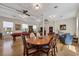 Bright recreation room showcasing a pool table, dining table, and comfortable seating area at 238 Tampa W Ave # 217, Venice, FL 34285