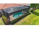 This screened-in pool and spa combo provide the perfect spot for relaxation and outdoor entertainment at 23823 Waverly Cir, Venice, FL 34293