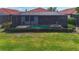 Enjoy the beautiful pool and spa in the screened-in lanai in this backyard oasis at 23823 Waverly Cir, Venice, FL 34293