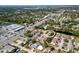 A neighborhood featuring well-maintained condos with lush landscaping near shops and a lake at 3417 Clark Rd # 217, Sarasota, FL 34231