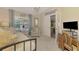 Bright bedroom features a comfortable daybed, desk and ample natural light at 3459 Lakewood Blvd, North Port, FL 34287