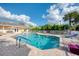 Enjoy the sunshine at the community pool, perfect for relaxing and socializing with neighbors at 3459 Lakewood Blvd, North Port, FL 34287