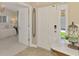Bright foyer with a view into the bedroom, features beautiful floors, and an inviting entrance at 3459 Lakewood Blvd, North Port, FL 34287