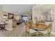Open-concept living spaces featuring a comfortable living room and dining area, perfect for entertaining at 3459 Lakewood Blvd, North Port, FL 34287