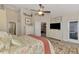 Spacious main bedroom showcasing a stylish dresser, closet, bathroom, and access to the outdoor area at 3459 Lakewood Blvd, North Port, FL 34287