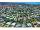 This neighborhood is home to several homes and dwellings surrounded by lush green landscaping at 416 Baycrest Dr, Venice, FL 34285