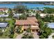 This neighborhood is home to several homes and dwellings surrounded by lush green landscaping at 416 Baycrest Dr, Venice, FL 34285