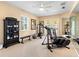 Well-equipped home gym with modern exercise equipment, mirrors, and ample space for a complete workout routine at 416 Baycrest Dr, Venice, FL 34285