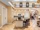 A gourmet kitchen with black granite countertops and tile flooring at 416 Baycrest Dr, Venice, FL 34285