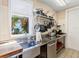 Prep area with stainless steel counters and a large sink in this well-lit kitchen at 416 Baycrest Dr, Venice, FL 34285