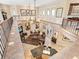 Aerial view of living room with an open floor plan, stylish furnishings, and elegant decor in a spacious setting at 416 Baycrest Dr, Venice, FL 34285