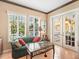 Bright sitting room with large windows and a view of the outdoors at 416 Baycrest Dr, Venice, FL 34285