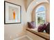 Cozy window seat area with comfortable cushions and a window overlooking the picturesque outdoors at 416 Baycrest Dr, Venice, FL 34285