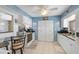 Bright kitchen featuring ample cabinet space, modern appliances, and tile flooring at 4437 Tippecanoe Trl # 6, Sarasota, FL 34233