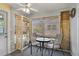Enclosed sunroom featuring a casual seating area with views to the outside at 4437 Tippecanoe Trl # 6, Sarasota, FL 34233