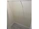 Spacious walk-in closet with a single shelf, providing storage space for clothing and accessories at 4595 Horseshoe Ave, North Port, FL 34286