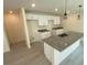 Bright kitchen features granite countertops and a stylish island, perfect for entertaining at 4595 Horseshoe Ave, North Port, FL 34286