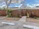 Cozy home featuring a private front yard with wood fence, walkway and tropical landscaping at 500 N Jefferson Ave # A3, Sarasota, FL 34237