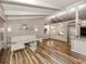 Bright living room with wood flooring, modern furnishings, vaulted ceilings, and lots of natural light at 500 N Jefferson Ave # A3, Sarasota, FL 34237